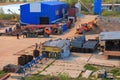 Scrap metal dealer in an industrial zone on the river bank Pregolya in Kaliningrad
